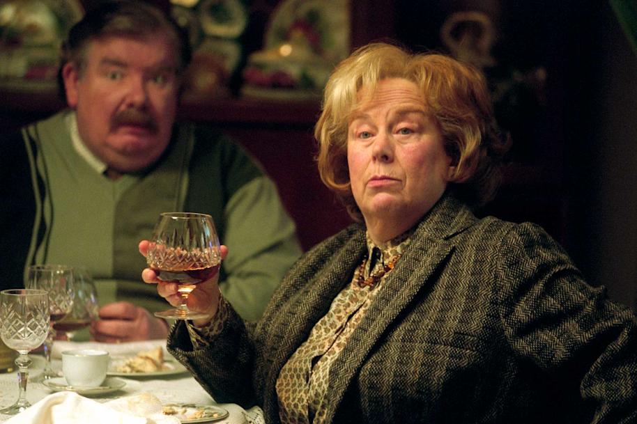 WB-HP3-aunt-marge-with-a-glass-with-uncle-vernon-looking-on