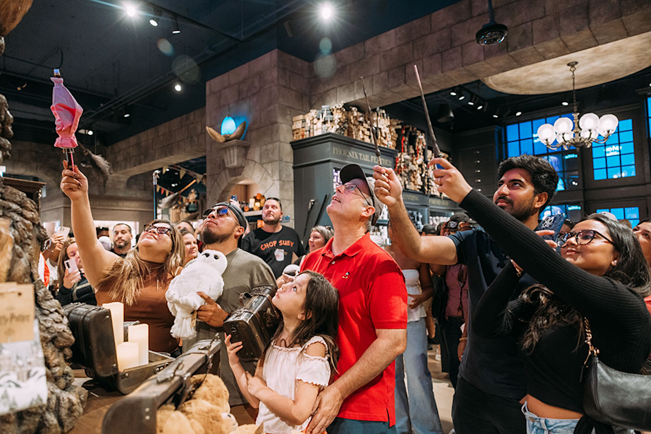 BTH-2025-global-celebrations-chicago-store-wands-raised-fans